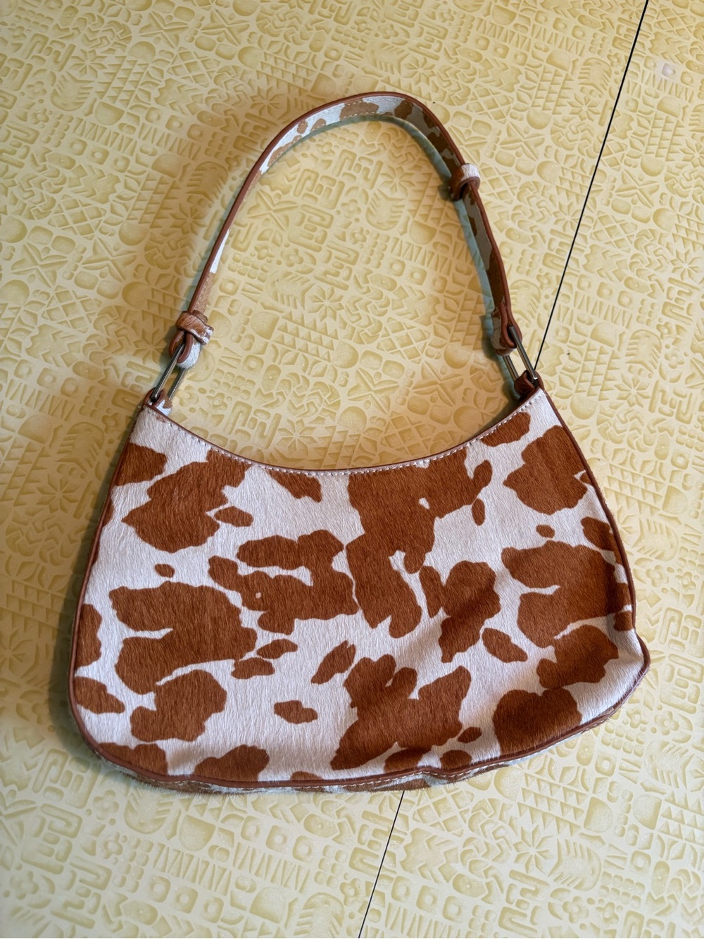 Urban Outfitters Brown and White Cowhide-Print Shoulder Bag